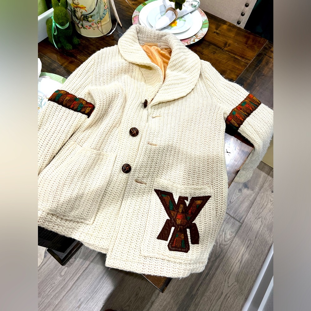 Vintage men’s knitted cream sweater with Native American thunderbird